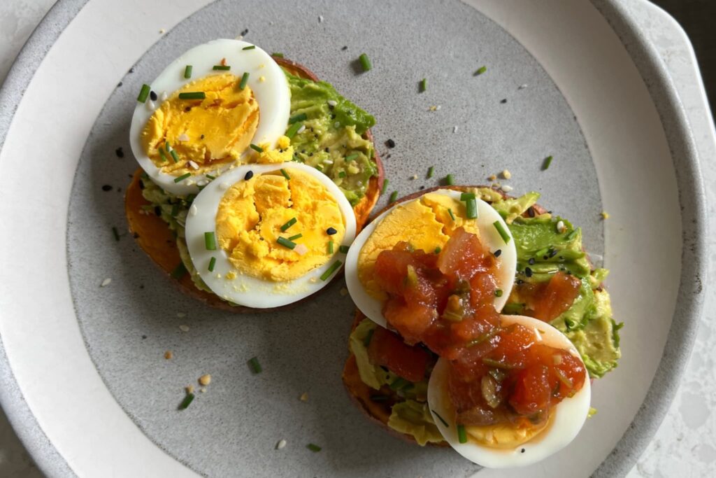 Sweet Potato Toast with Avocado and Egg on grey plate.