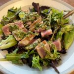 Seared Tuna and Mixed Greens Salad with Chimichurri Sauce.