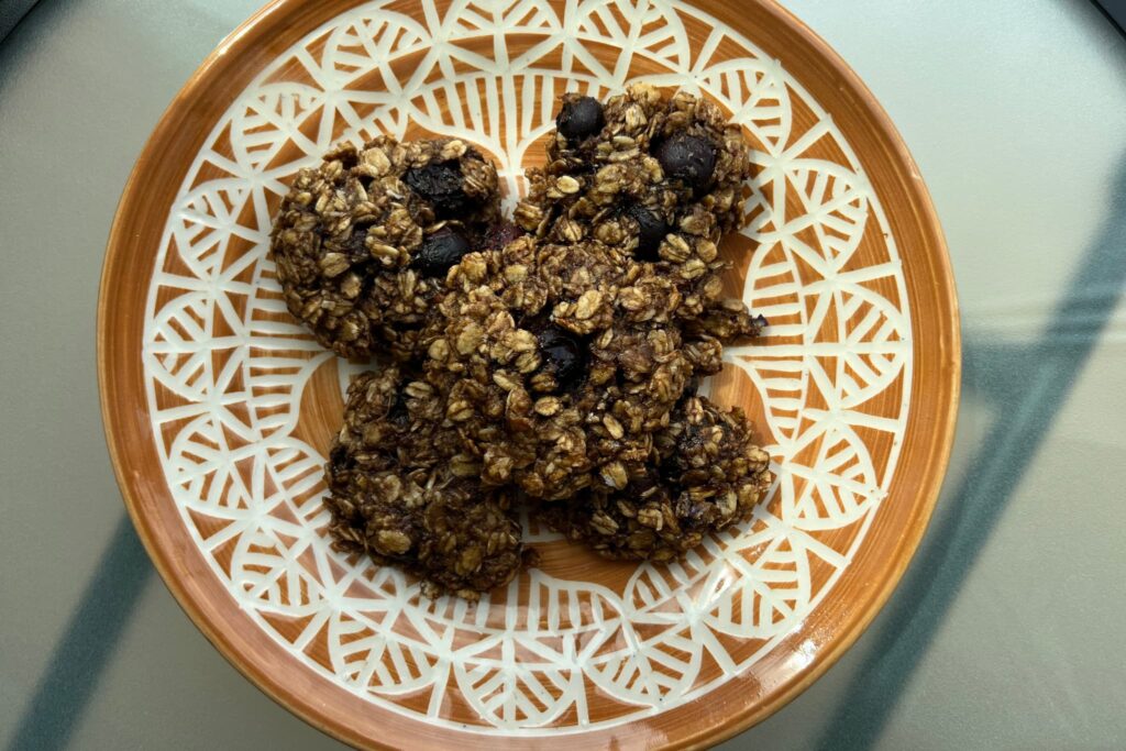 Oatmeal and Blueberry Breakfast Cookies on decorative plate.