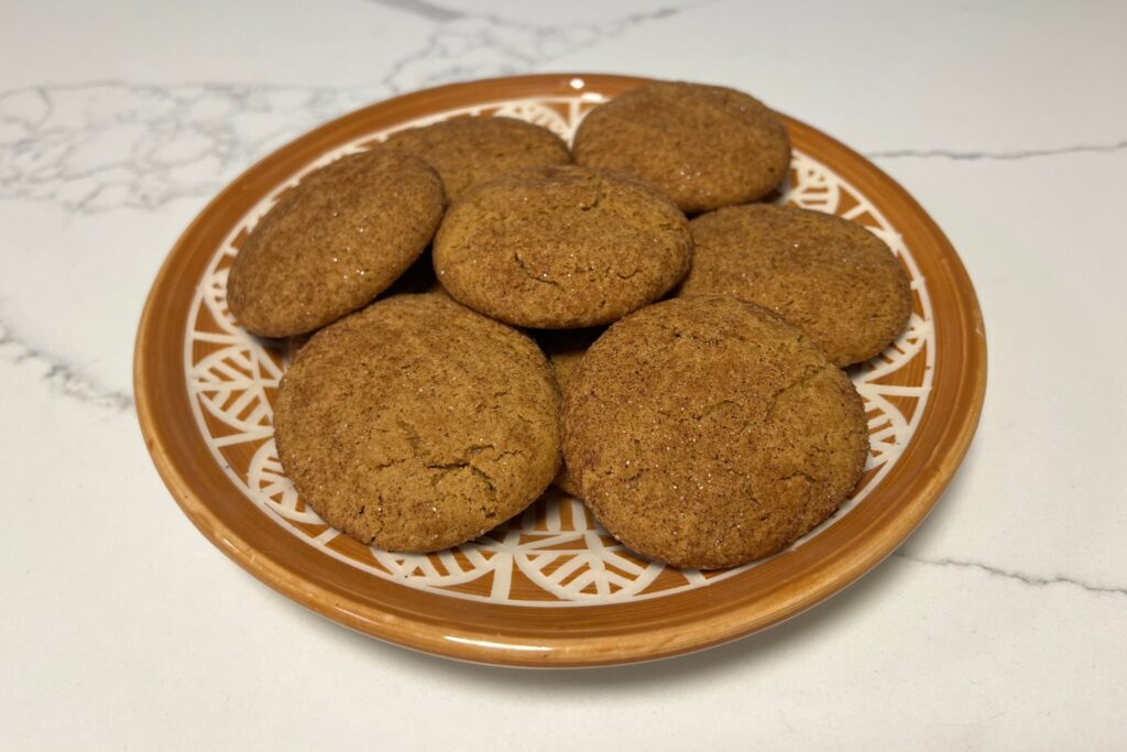 gingerdoodle cookies on orange plate.